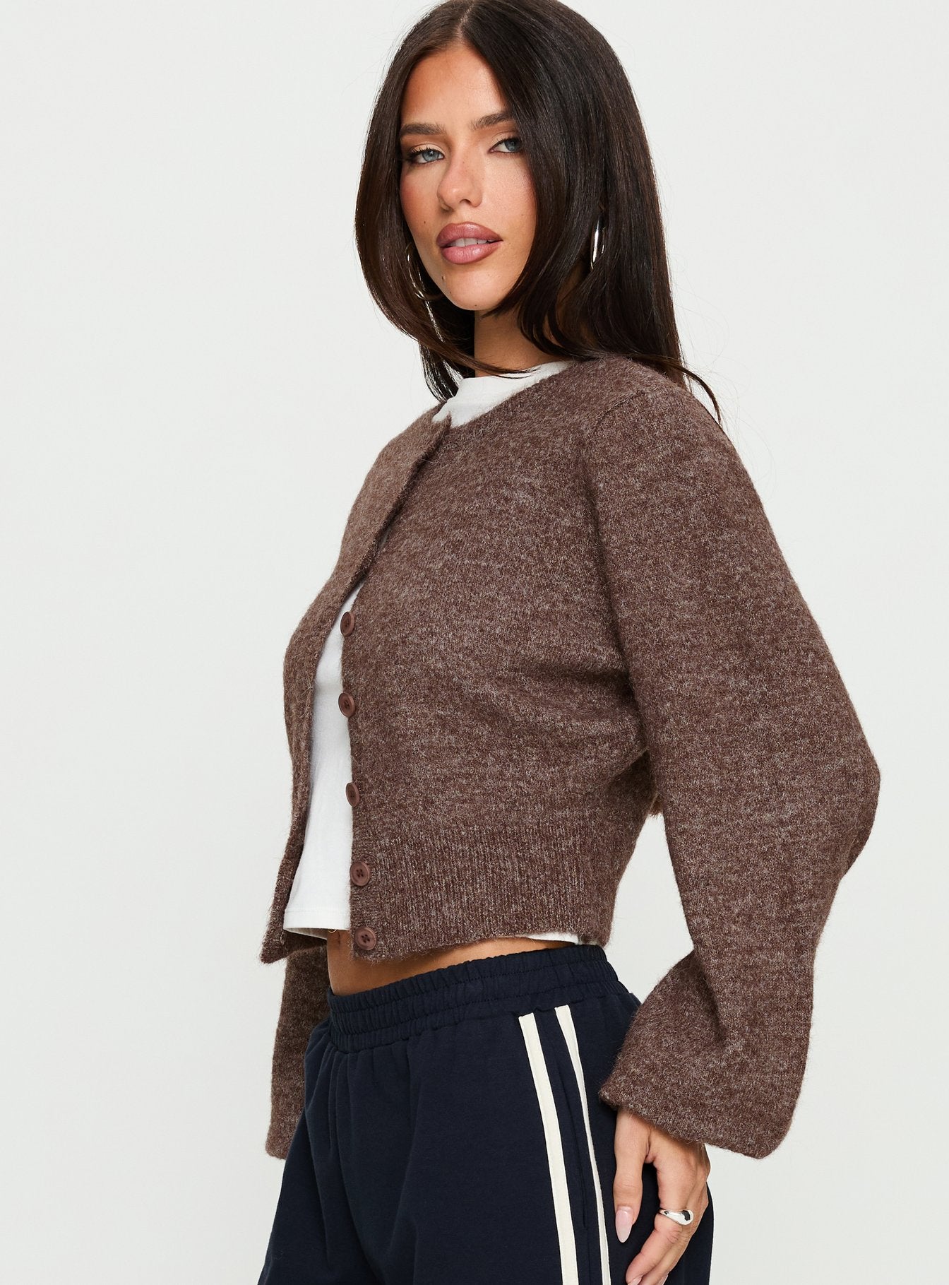 side view of model wearing Princess Polly Dawsen Button Down Cardigan Brown cropped 