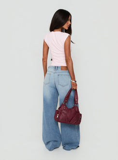 Crafted from Lokura Low Rise Super Baggy Jeans Vintage Mid Blue Wash womens-jeans back view of model wearing Princess Polly