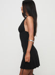 side view of model wearing Princess Polly Tinisie Halter Mini Dress Black Tall Plunger 