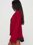 side view of model wearing Princess Polly Selma Shirt Burgundy Full Sleeves V-Neck 