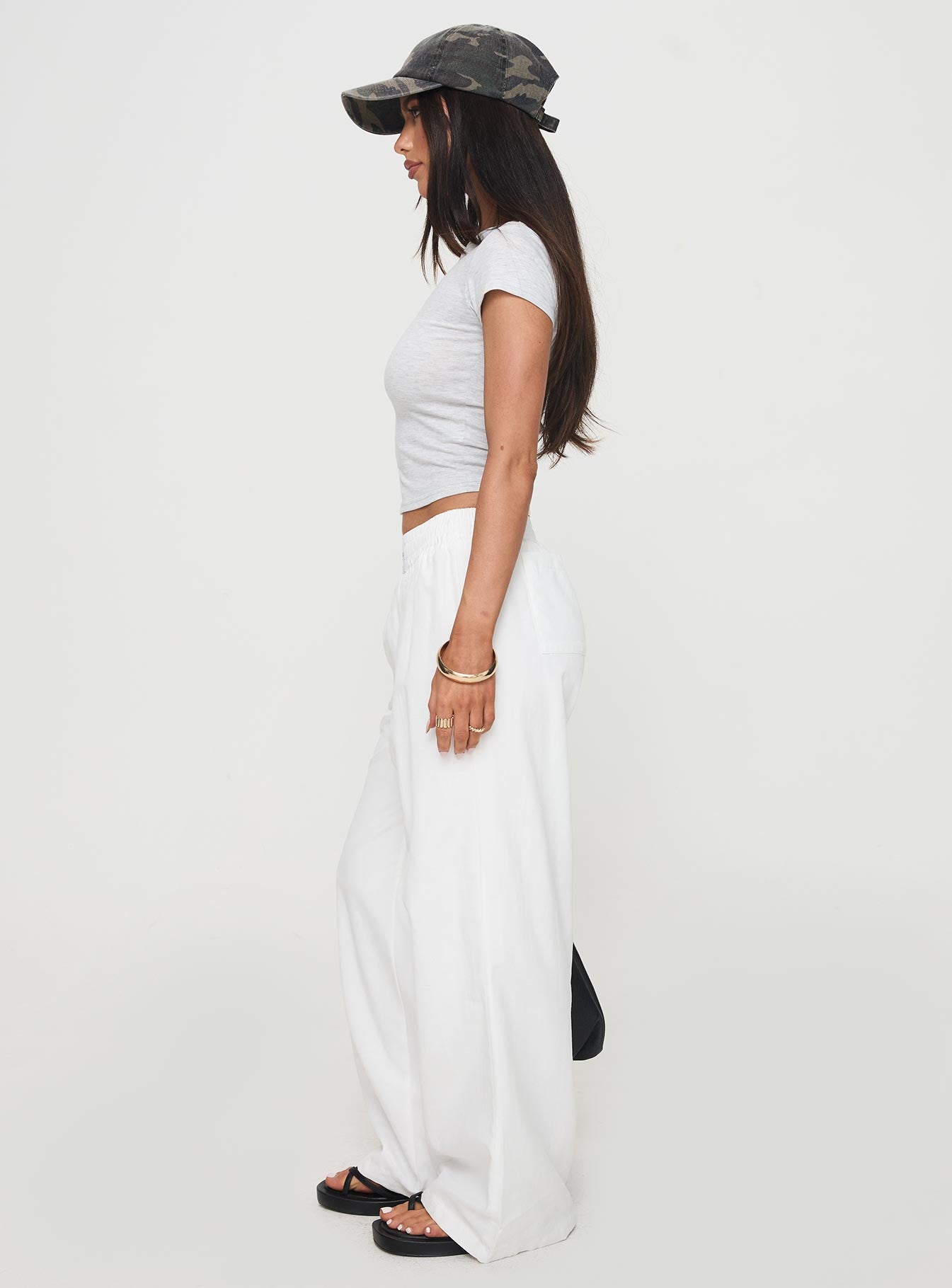 side view of model wearing Princess Polly Beach House Pants White Tall High Waisted Pants 
