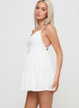 side view of model wearing Princess Polly Cona Mini Dress White V-Neck 