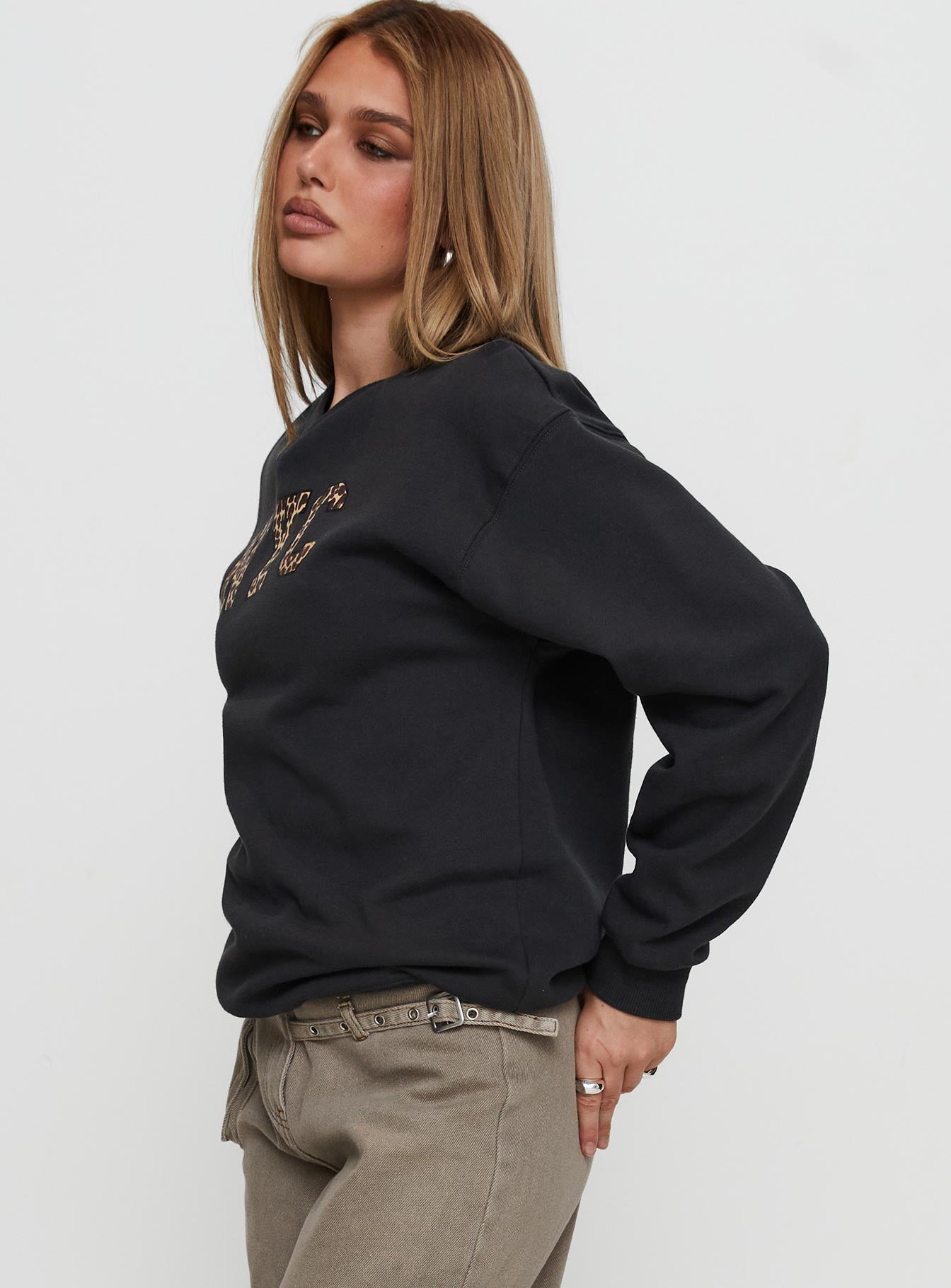 side view of model wearing Princess Polly Wild In NYC Sweater Black 