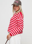 side view of model wearing Princess Polly Freeze Knit Sweater Red 