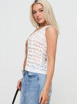 side view of model wearing Princess Polly Quillan Top White Sleeveless V-Neck 