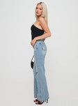 side view of model wearing Princess Polly Girard Wide Leg Denim Jeans Light Blue Wash High Waisted 