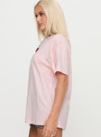 side view of model wearing Princess Polly Asta Oversized Tee Pink Half Sleeves Crew Neck 