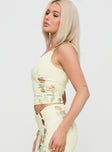 side view of model wearing Princess Polly Rios One Shoulder Top Yellow Floral Sleeveless Asymmetric Neckline 