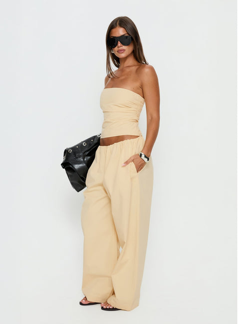 side view of model wearing Princess Polly Tidekiss Pants Lemontini Mid Rise Pants 