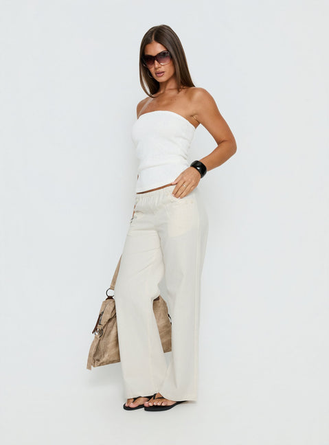 side view of model wearing Princess Polly Around The Clock Button Detail Mid Rise Wide Leg Pants Cream Mid Rise Pants 