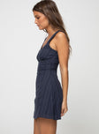 side view of model wearing Princess Polly Dasha Mini Dress Navy Petite Square Neck 