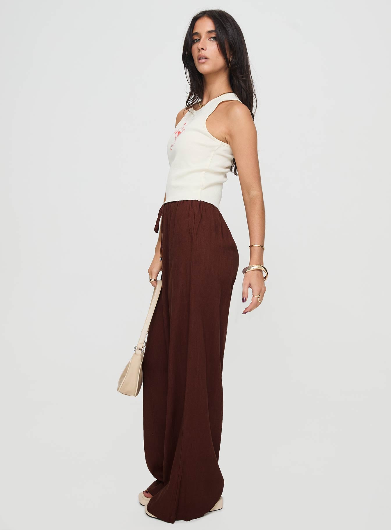 side view of model wearing Princess Polly Ogilvie Linen Blend Pants Chocolate High Waisted Pants 