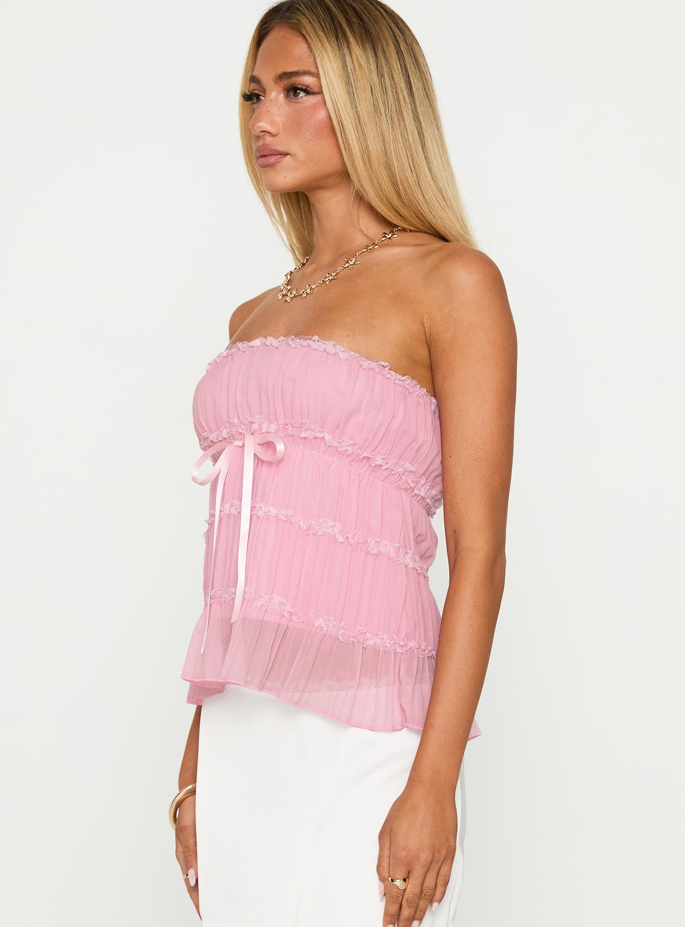 side view of model wearing Princess Polly Avelina Strapless Top Pink Sleeveless straight 
