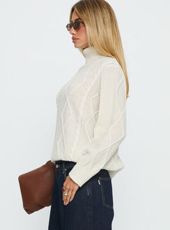 side view of model wearing Princess Polly Tarynne Cable Knit Turtle Neck Sweater Beige Long 