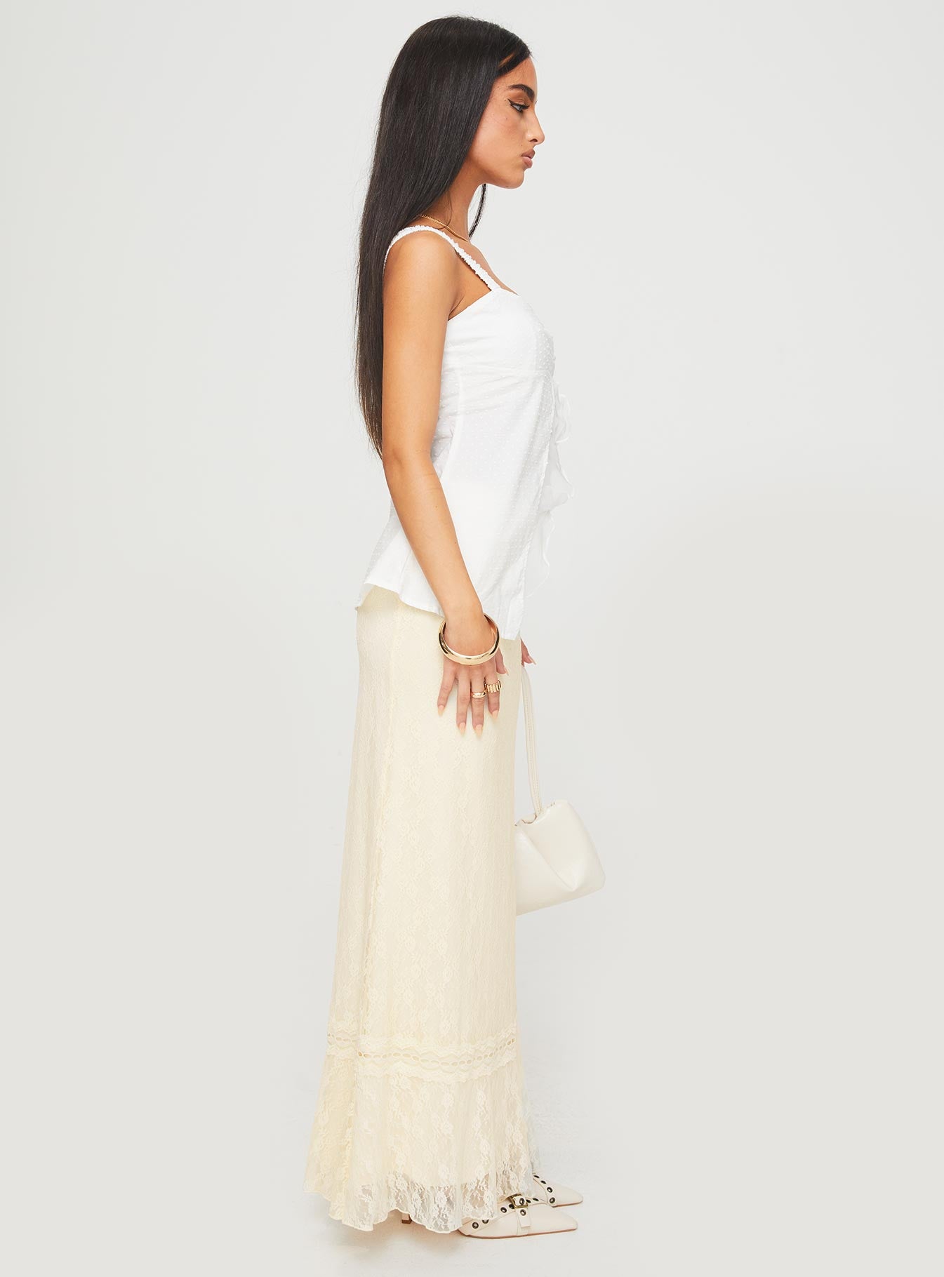   side view of model wearing Princess Polly Deanie Skirt Cream Maxi 