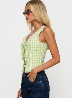 side view of model wearing Princess Polly Wayland Tie Up Lace Trim Top Green Check Sleeveless V-Neck 