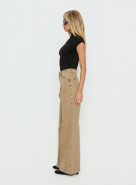 side view of model wearing Princess Polly Goldie High Rise Wide Leg Jeans Tan High Rise Jeans 