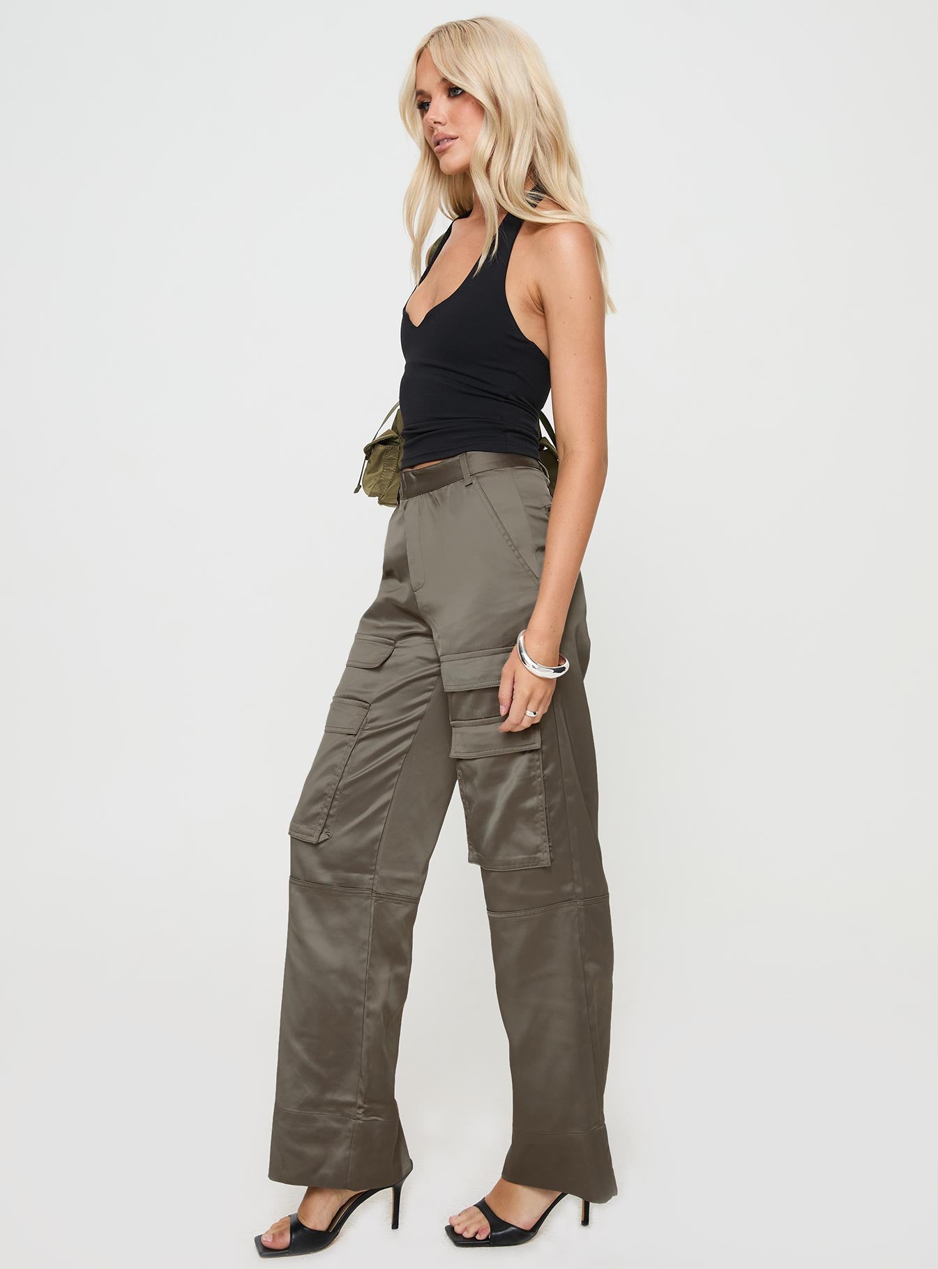 side view of model wearing Princess Polly Crimsen Cargo Pants Chocolate High Waisted Pants 