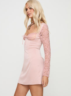 side view of model wearing Princess Polly Markwell Long Sleeve Mini Dress Pink Sweetheart Neckline 