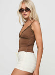 side view of model wearing Princess Polly Biline Top Brown Sleeveless V-Neck 