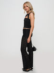 side view of model wearing Princess Polly Jubilee Flare Pants Black High Waisted Pants 