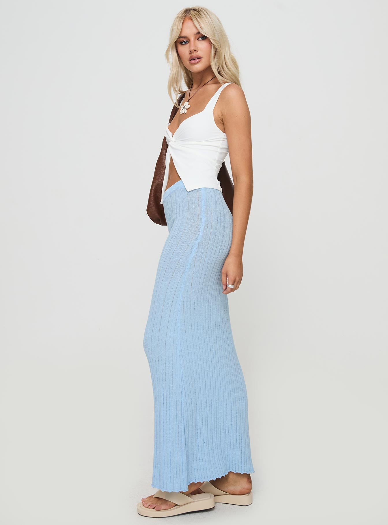   side view of model wearing Princess Polly Belle Knit Maxi Skirt Baby Blue Maxi 