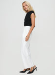 side view of model wearing Princess Polly Jazzar Pocket Detail Pleated Pant White High Waisted Pants 