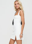 side view of model wearing Princess Polly Bombshell Mini Dress White Tall Square Neck 