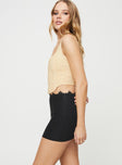 Mini skirt Lace trim at waistband Invisible zip fastening at side Slight stretch