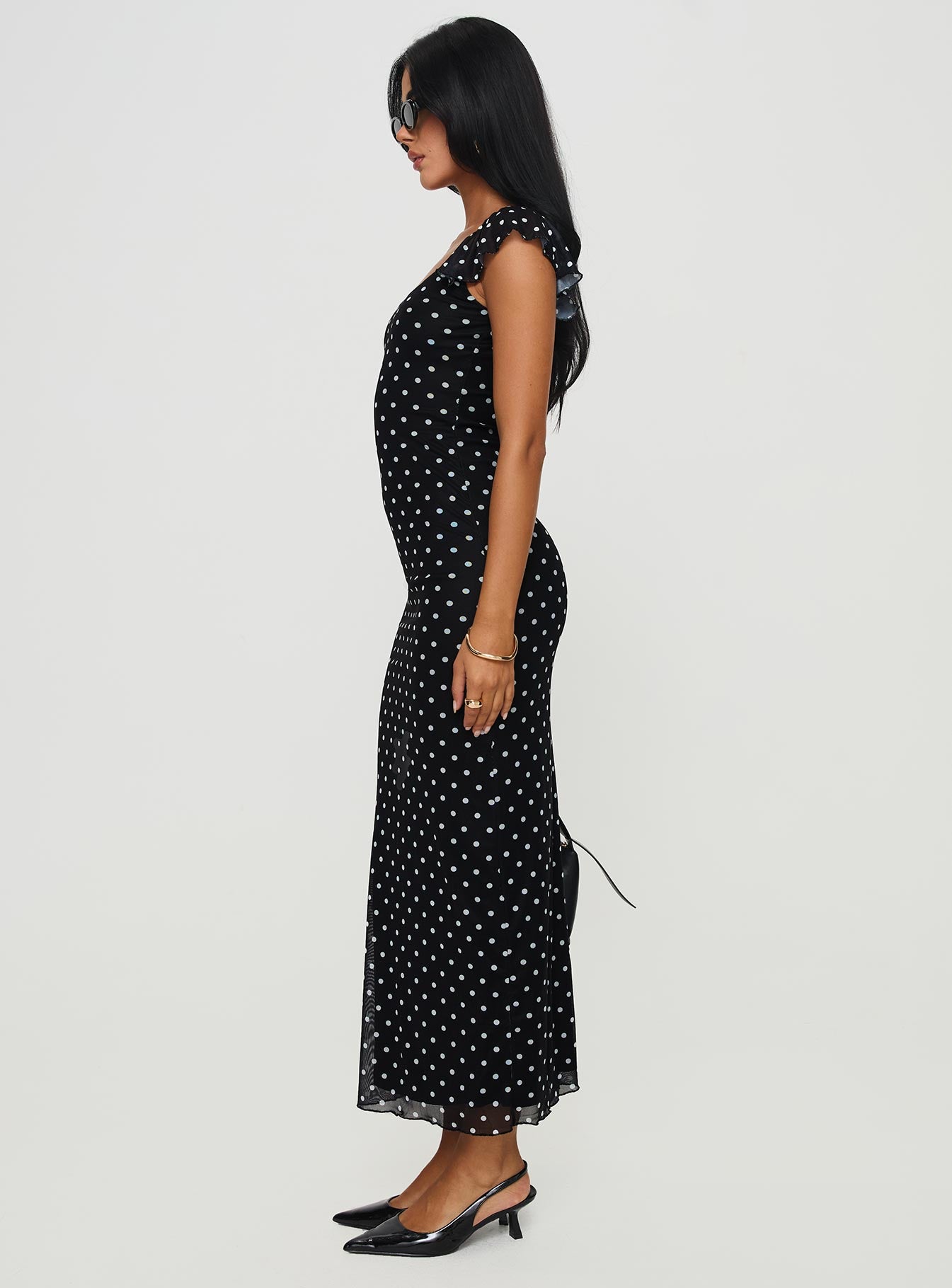 side view of model wearing Princess Polly Sandberg Maxi Dress Black Polka Dot Scoop Neck 