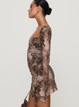 side view of model wearing Princess Polly Suareza Long Sleeve Mini Dress Leopard Sweetheart Neckline 