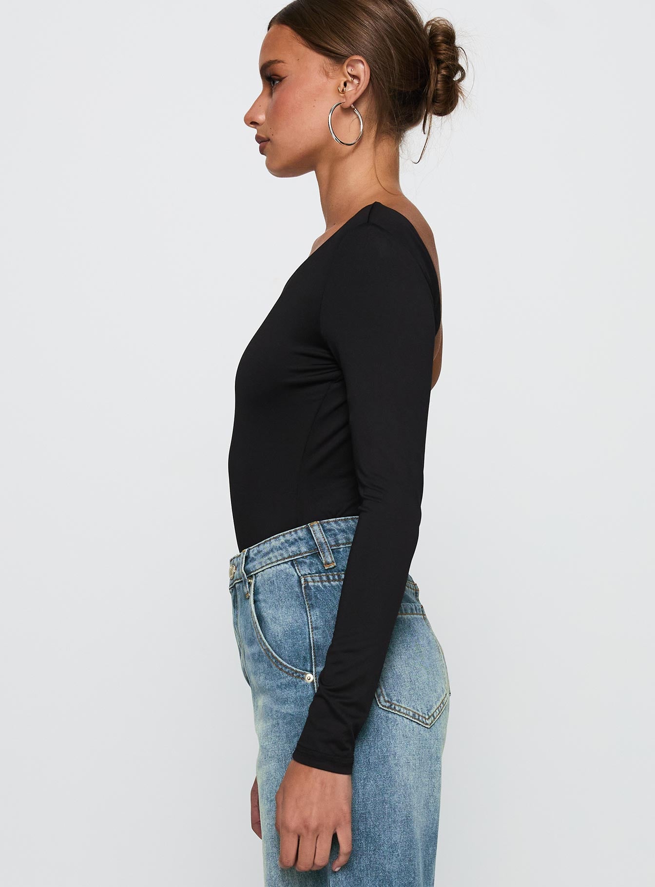 side view of model wearing Princess Polly Look This Good Backless Bodysuit Black Long Sleeve Tops 