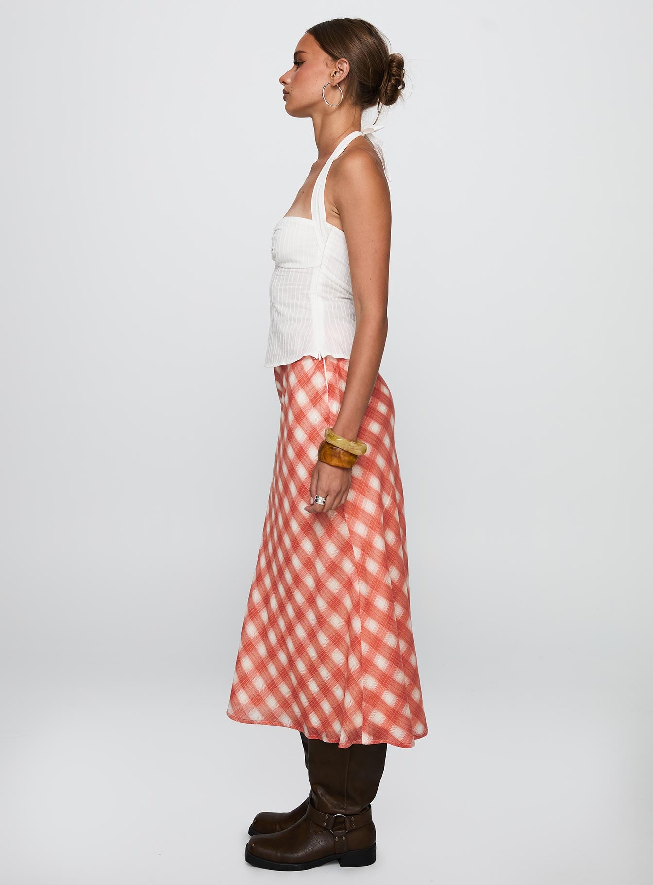   side view of model wearing Princess Polly Living Color Maxi Skirt Orange Gingham Midi Skirts 