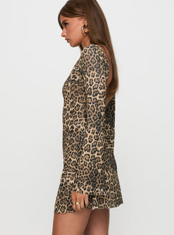 side view of model wearing Princess Polly Lukea Long Sleeve Mini Dress Leopard Boat Neck 