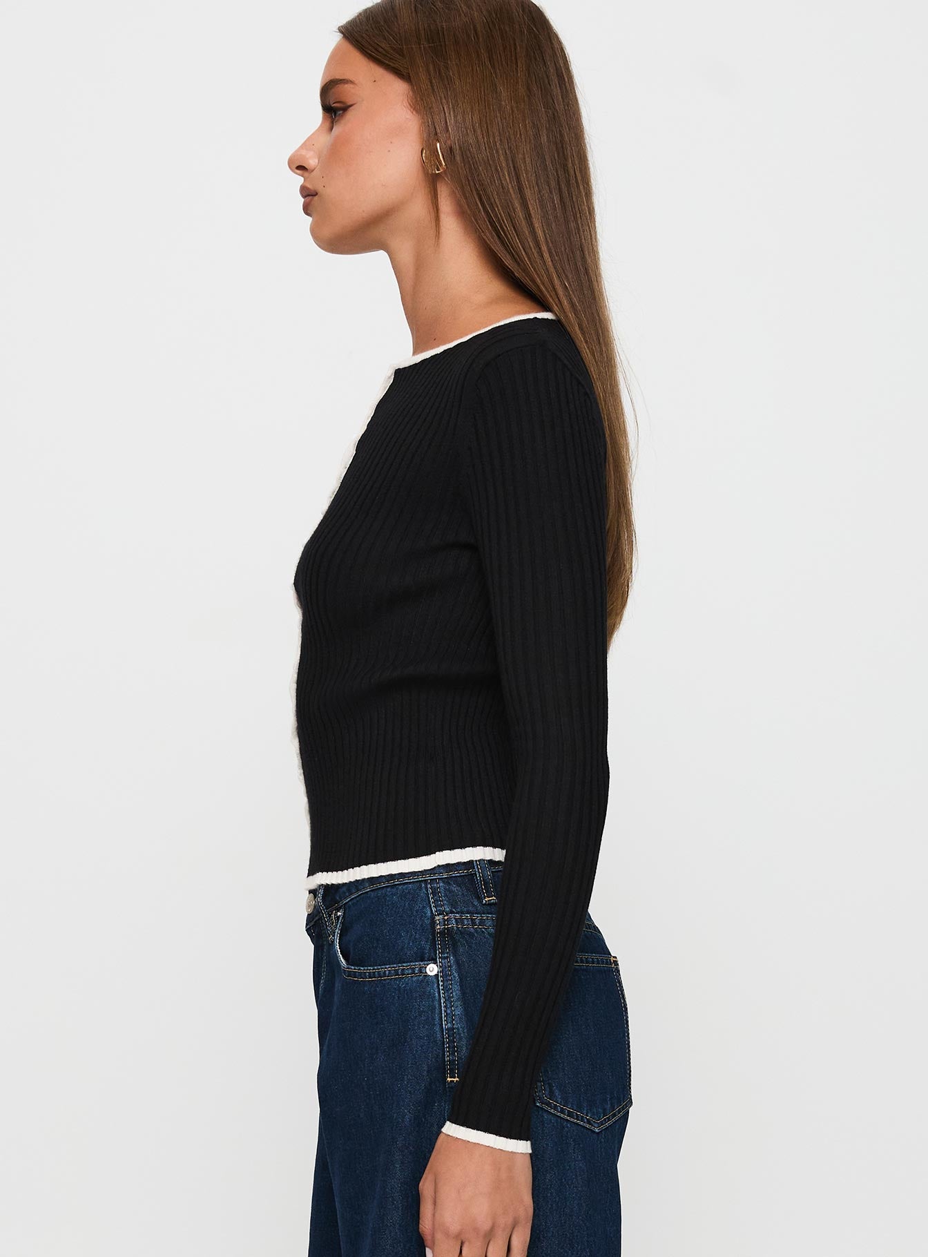 side view of model wearing Princess Polly Bring Me Closer Button Up Long Sleeve Top Black / White Full Sleeves Crew Neck 