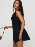 side view of model wearing Princess Polly Oliveah Frill Mini Dress Black Square Neck 