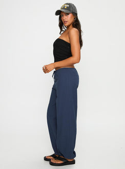 side view of model wearing Princess Polly Zodie Low Waist Pants Navy Low Rise Pants 
