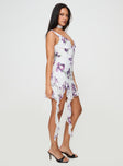 side view of model wearing Princess Polly Varney Frill Mini Dress White / Purple Floral Plunger 