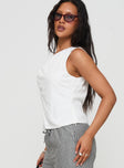 side view of model wearing Princess Polly Shanara Top White Sleeveless Asymmetric Neckline 