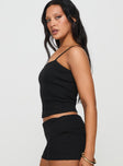 side view of model wearing Princess Polly Baseline Rib Top Black Sleeveless Square Neck 