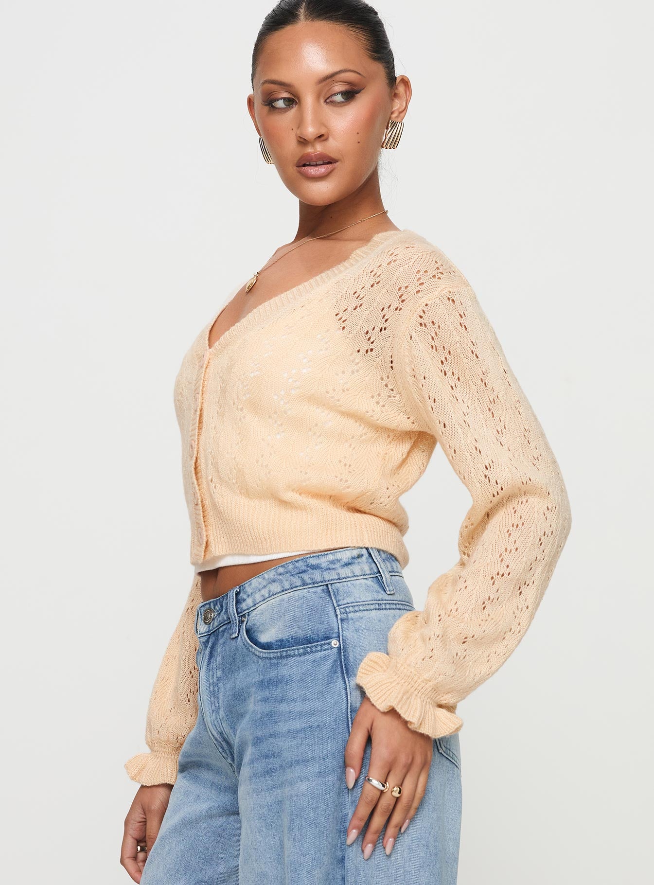 side view of model wearing Princess Polly Lyric Cropped Cardigan Beige Cropped 