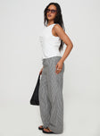 side view of model wearing Princess Polly Veridian Pants Black/White Stripe 