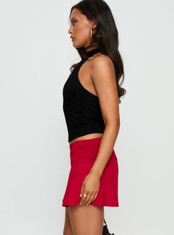   side view of model wearing Princess Polly Tamsyn Ruched Mini Skirt Red Mini Skirts 