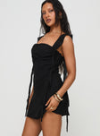 side view of model wearing Princess Polly Lanai Mini Dress Black Square Neck 