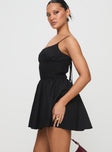 side view of model wearing Princess Polly Matisse Mini Dress Black Tall Square Neck 