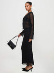   side view of model wearing Princess Polly Colombo Maxi Skirt Black Maxi 