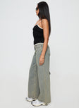 side view of model wearing Princess Polly Jaycee Low Rise Wide Leg Jeans Antique Wash Low Rise Jeans 