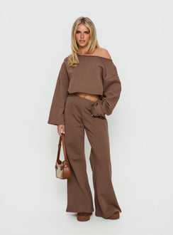 front view of model wearing Princess Polly Peaks Flared Track Pants Cocoa Mid Rise Pants 