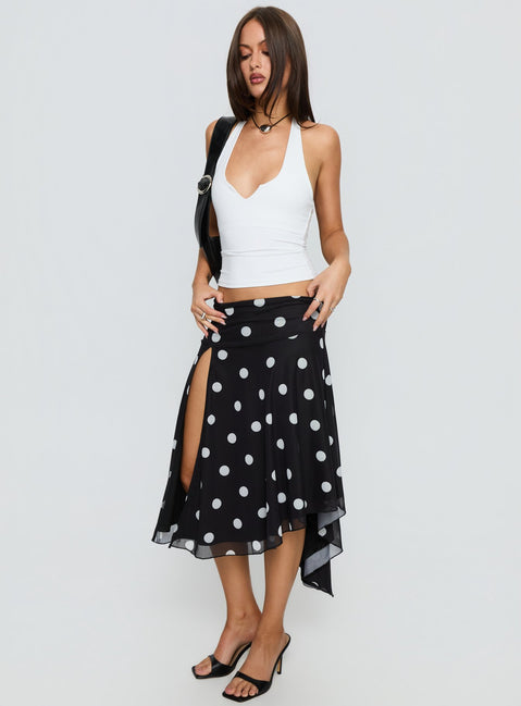   front view of model wearing Princess Polly Dulciana High Split Asymmetrical Midi Skirt Black / Polka Dot Midi Skirts 
