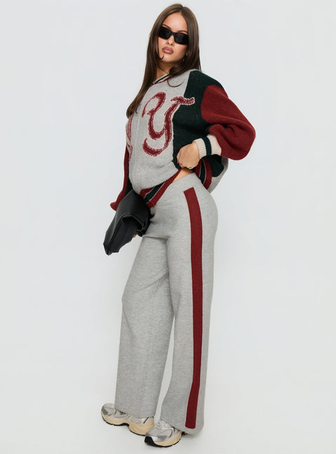 side view of model wearing Princess Polly Brandyce Straight Leg Knit Pants Grey / Red High Rise Pants 